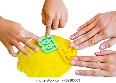 Top View Mother And Boy Hands Play Doh Or Dough On Isolated White Background With Space