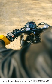 Top view of motorcycle handlebar and odometer outdoors