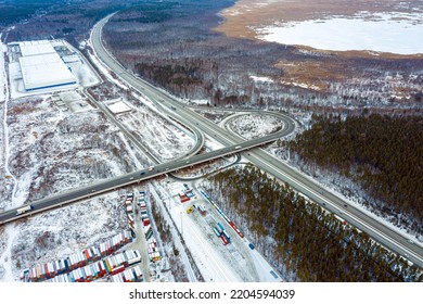 Top View Of The Movement Of Cars Through A Busy Intersection With An Overpass