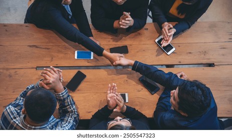 Top view of MultiEthnics Teamwork high five hands stack shakehand together. Collaboration Team Meeting in Conference Room. Diversity Partner Business Meeting brainstorm hand holding teamwork consult