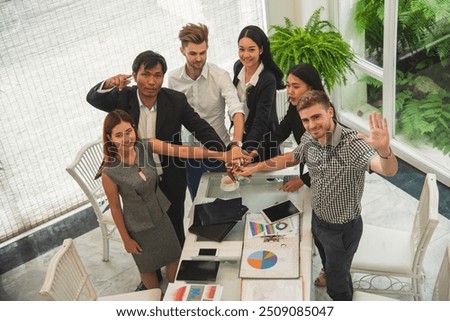 Top view of MultiEthnics Teamwork high five hands stack shakehand together. Collaboration Team Meeting in Conference Room. Diversity Partner Business Meeting brainstorm hand holding teamwork consult