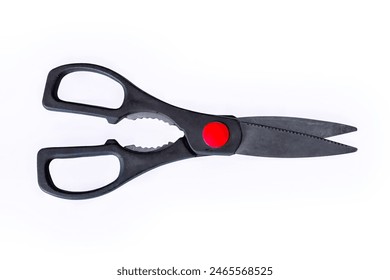 Top view of multipurpose kitchen scissors isolated on white.