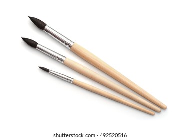 Top view of new  artistic paint brushes set isolated on white - Powered by Shutterstock