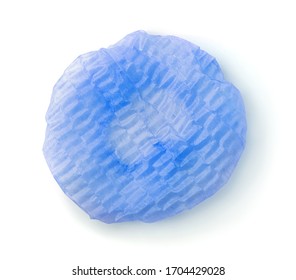 Top view of non woven blue disposable bouffant cap isolated on white
