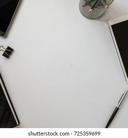 Top View Of An Office Desk With Stationery Items