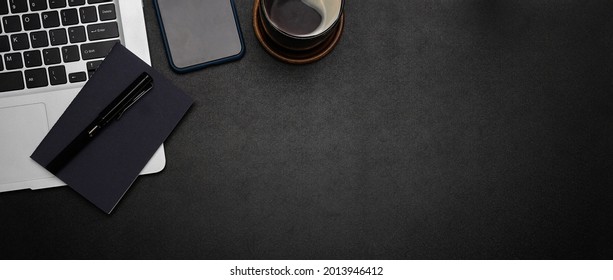 Top View Office Stuff With Notepad, Laptop And Coffee Cup Mouse Notepad Shot.blank Screen Mobile Phone And Supplies On Desk Workspace And Copy Space.