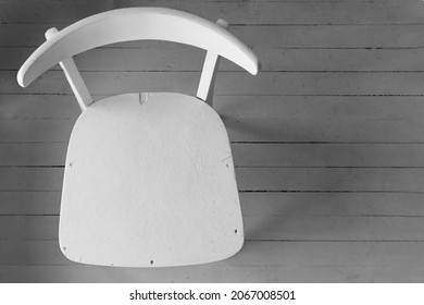 Top view of an old chair painted white
