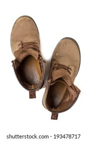 Top View Of Old And Dirty Boots Isolated On White Background