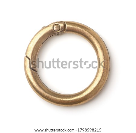 Top view of old empty bronze keyring isolated on white