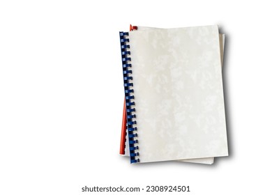 Top view of old plastic ring binding notepad paper files isolated on white background with clipping path, horizontal format.