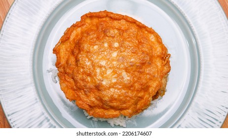 Top View Omelette In White Plate Isolated On White Background.	