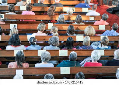 Top View On A Christian Community At A Church Service Or Concert In A Church - Selective Focus