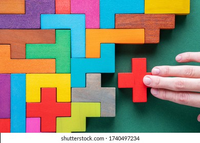 Top view on colorful wooden blocks. Concept of decision making process, logical thinking. Logical tasks