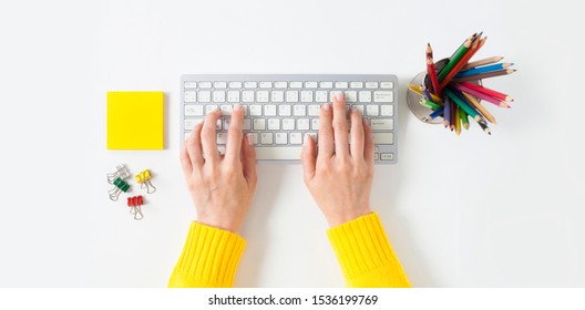 Top View On Female Elegant Hands On A Computer Keyboard. Isolated White Background. Simple Design, Large Copy Space For Your Designs