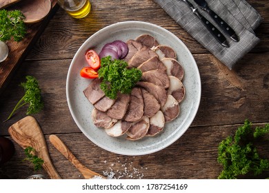 Top view on kazakh national horse meat sausage qazy platter