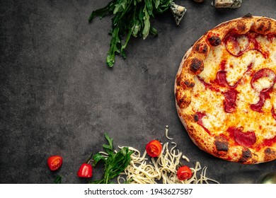 Top View On Neapolitan Fresh Baked Pepperoni Pizza On The Grey Background