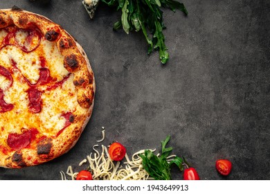 Top View On Neapolitan Fresh Baked Pepperoni Pizza On The Grey Background Copy Space
