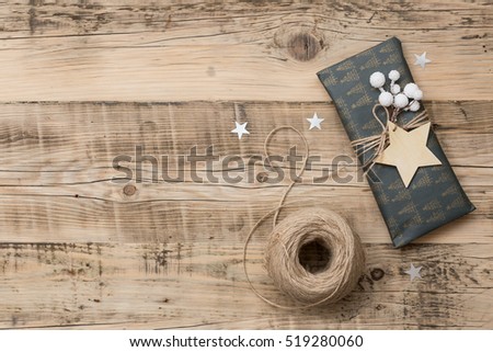 top view on nice christmas gifts packed in black and striped paper and decorated with stars - Nice Christmas Gifts top view on nice christmas gifts packed in black and striped paper and decorated with stars - Nice Christmas Gifts