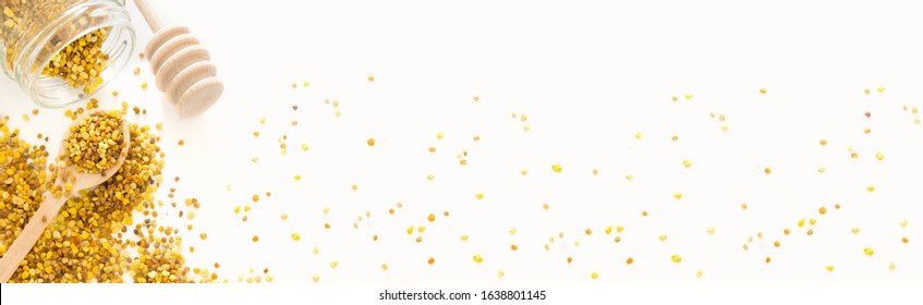 Top View On Raw Organic Bee Pollen Granules On A White Banner Background  With Copy Space.