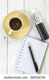 Top view on a table in the workplace with coffee