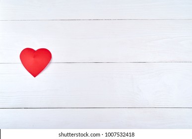 Top View Of One Red Paper Heart On White Wooden Background, Copy Space For Text. Greeting Card Mockup For Saint Valentines Day, Flat Lay. Symbol Of Love, Free Space. Love, Wedding Concept