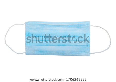 Top view of one surgical disposable face mask PP 3-ply with earloop isolated on white background - used in COVID-19 global pandemic of coronavirus SARS-CoV-2