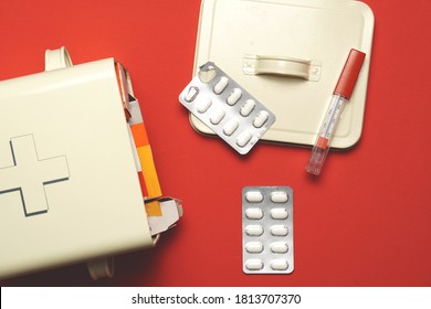 Top View Of Open Medicine Cabinet With Pills And Boxes And Thermometer. Flat Lay Flat Design