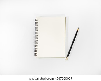 Top View Open Notebook And Pencil Potted On White Background.