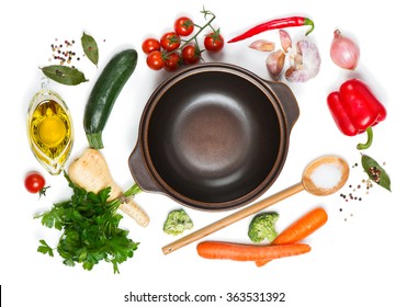  Top view of open pan, fresh raw vegetable and spices for soup isolated on white background - Powered by Shutterstock