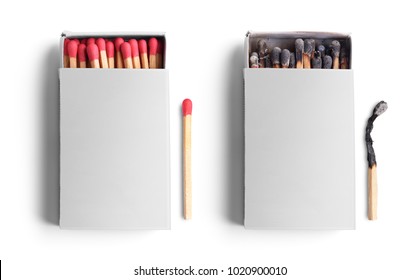 Top view of opened match boxes with burned matchsticks. Isolated on white background