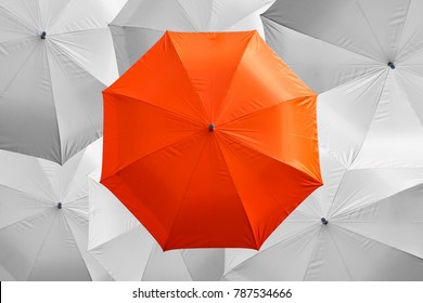 Top View Of Orange Umbrella On White Umbrella  