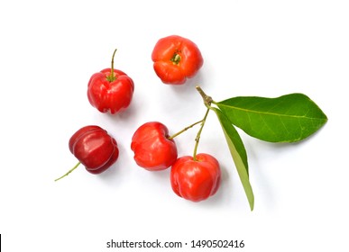 Top View Of Organic Acerola Cherry With Green Leaves Isolated On White Background.