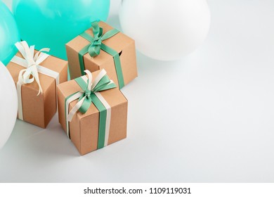 Top view over the gift boxes with ballons and party decoration. Parties and celebration concept