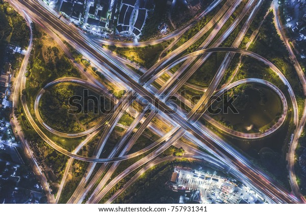 Top view over the highway,\
Controlled-access highway, the highest-grade type of highway with\
access ramps, lane dividers, etc., for high-speed\
traffic