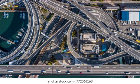 Top view over the highway, expressway and motorway architecture, Aerial view overhead infrastructure interchange transport of Osaka City, Osaka, Kansai, Japan.