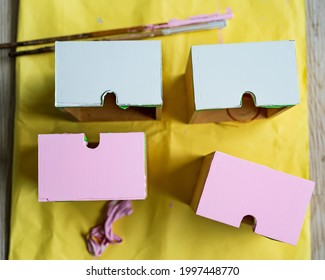 Top View Of Painted Boxes In Pink And White Colour. Upcycle, Recycle And Home Makeover Project.