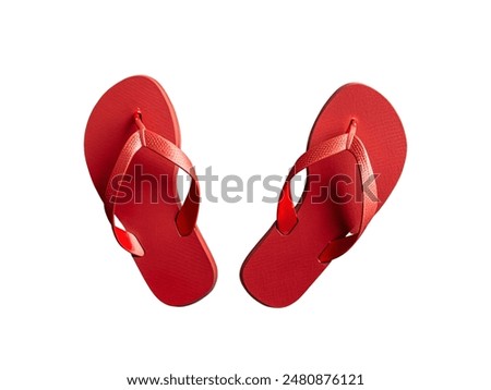 Top view pair of beach red flip flops isolated on white background
