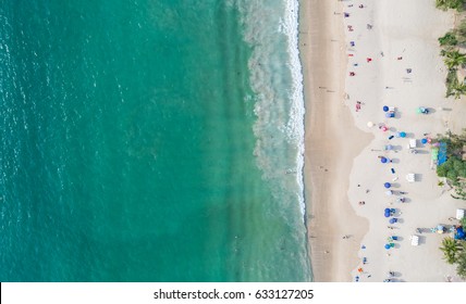 Top view Patong beach in Phuket province, southern of Thailand. Patong beach is a very famous tourist destination in Phuket. Aerial view from flying drone.