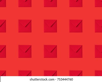 top view of pattern made from red envelopes isolated on red