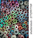Top View Pattern of Multi-Colored Sewing Thread Spools