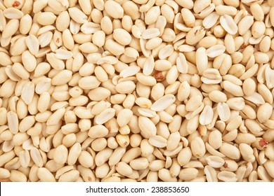 Top view of peeled peanuts as background , texture