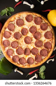 Top View Pepperoni Pizza With Blackbackground