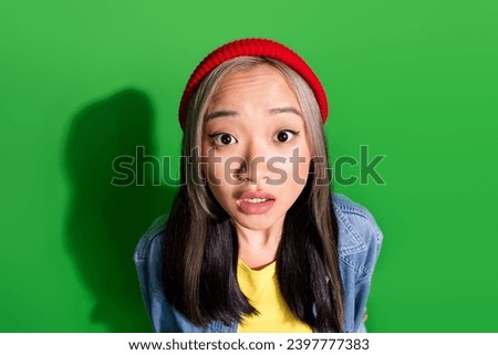 Top view photo of excited impressed lady wear denim jacket looking you isolated green color background