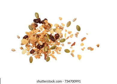 Top view photo of granola pile isolated on white background, muesli texture, scattered seeds pattern, cereal grain for good health