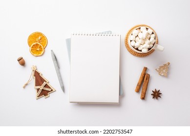Top View Photo Of Open Notepad Pen Cup Of Cocoa With Marshmallow Dried Orange Slices Acorn Christmas Tree Wooden Ornament Anise Cinnamon Sticks Decorative Clip Isolated White Background With Copyspace