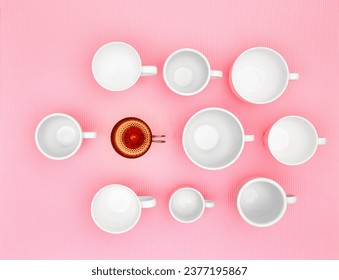 Top view photo of plenty variety of clean white elegant porcelain coffee or tea cups against pink studio background. Concept of food, holiday, table setting, retro, vintage, etiquette, ethics, decorum