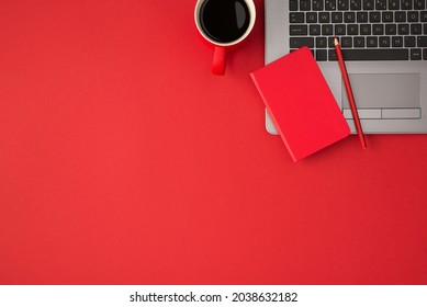 Top View Photo Of Red Closed Reminder Pencil On Laptop And Cup Of Coffee On Isolated Red Background With Copyspace