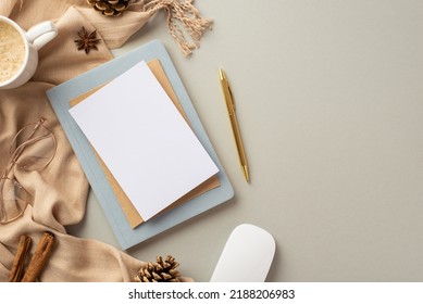 Top view photo of workspace paper sheet envelope on notepad gold pen computer mouse cup of coffee glasses cinnamon sticks anise pine cones and scarf on isolated grey background with copyspace - Powered by Shutterstock