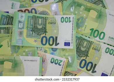 A Top View Of A Pile Of 100 And 200 Euro Banknotes