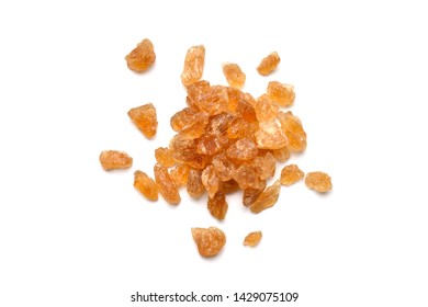 Top View Pile Of Brown Rock Sugar (candy Crystal Sugar) On White Background.